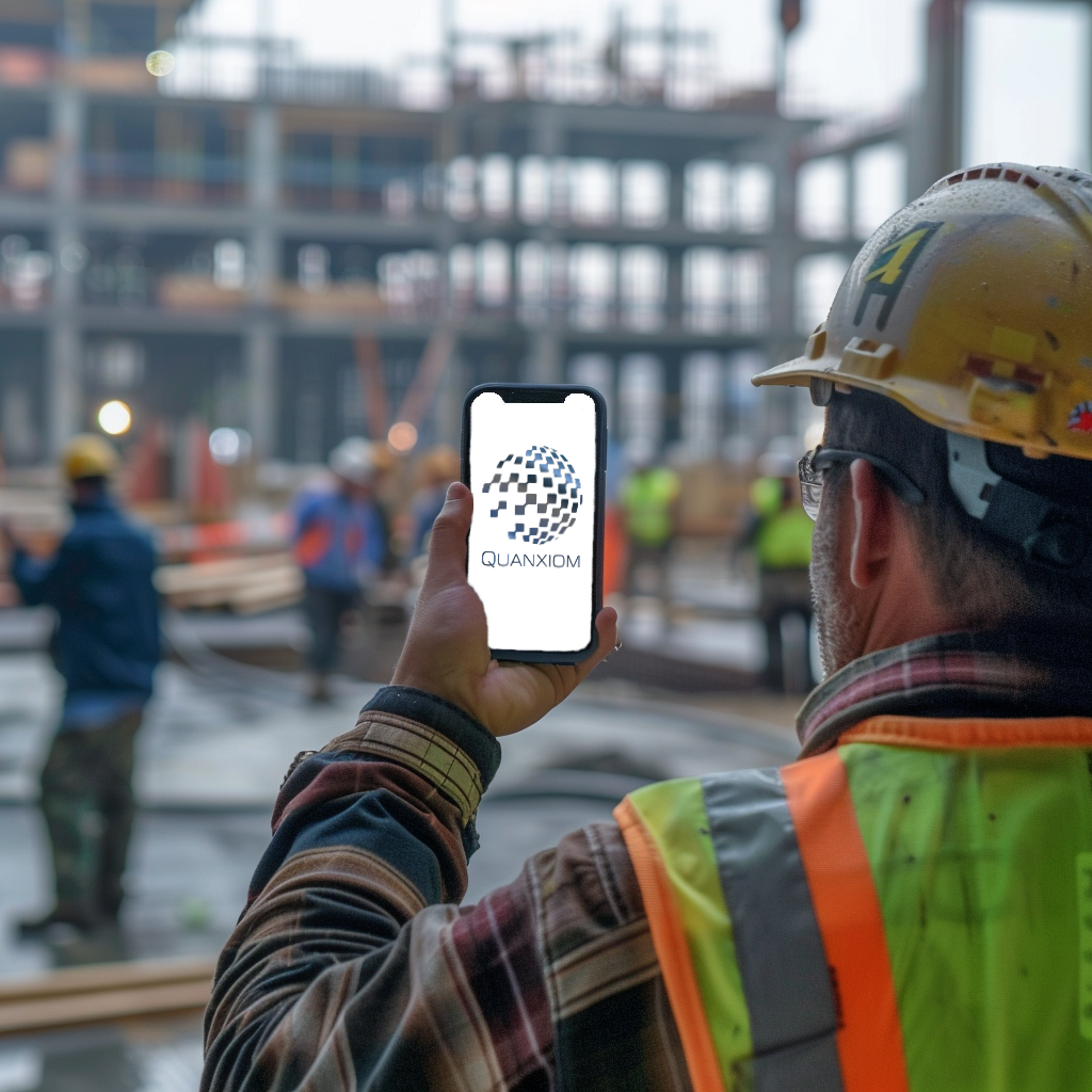 Construction worker using Quanxiom mobile app